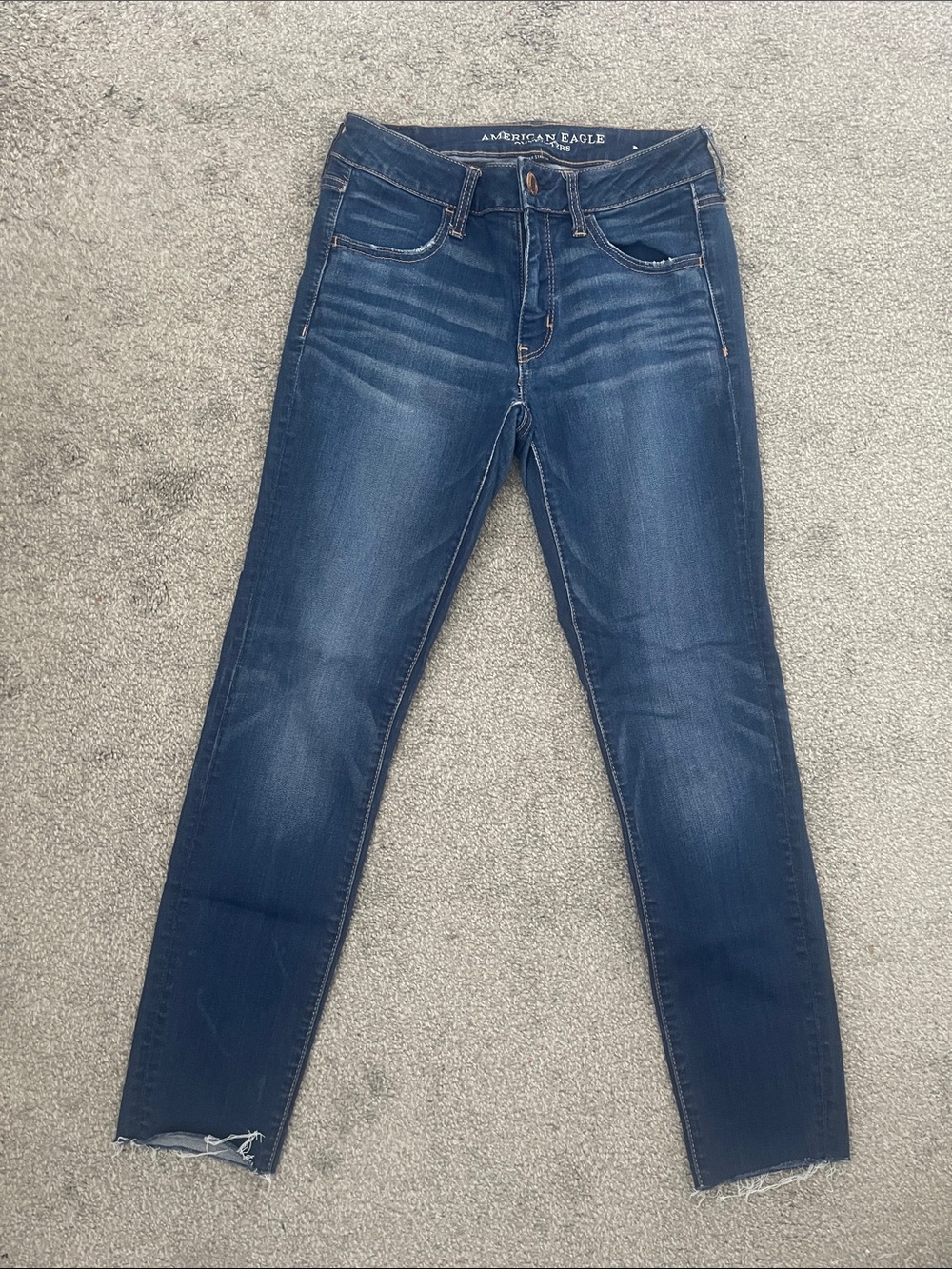 American Eagle Outfitters Dark Blue Skinny Jeans with Frayed Hem
